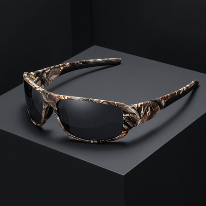 Grey lens camouflage sunglasses in a charcoal studio setting.